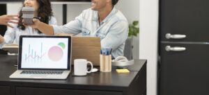 co-workers in the office working, in advertising